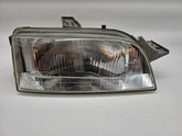 Main headlight right with leveling control - signs of wear - Hella FIAT